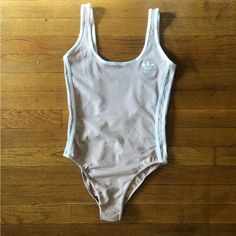 Stretchy Bodysuit. Nude Color. Like New, Never Worn. More Photos Upon Request. Casual Adidas Swimwear, Adidas Fitted Sleeveless Swimwear, Adidas Casual Swimwear For Summer, Casual Adidas Swimwear For Summer, Adidas Casual Summer Swimwear, Adidas Tops, Nude Color, Body Suit, Adidas Women