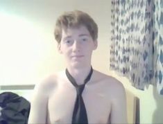 a shirtless man wearing a tie and no shirt