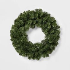 a christmas wreath on a white background