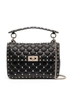 black nappa leather gold-tone Rockstud detailing single top handle chain-link shoulder strap foldover top twist-lock fastening internal patch pocket Valentino Rockstud Bag, Spike Bag, Valentino Bag, Leopard Tote, Valentino Garavani Bag, Ankle Tie Sandals, Valentino Rockstud, Valentino Bags, Black Cross Body Bag