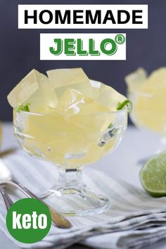 a glass bowl filled with lemonade jello on top of a table