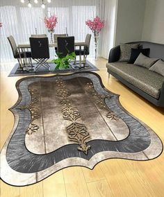 a living room filled with furniture and a large rug