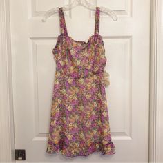 Altar’d State Purple And Yellow Floral Print Mini Dress Ruffle Details Zipper Closure Size: Women’s S Condition: Brand New With Tags Fitted Floral Print Sundress For Daywear, Fitted Multicolor Dresses For Daywear, Fitted Sundress With Ditsy Floral Print, Fitted Ditsy Floral Print Sundress, Fitted Yellow Mini Dress With Floral Print, Multicolor Mini Floral Sundress, Yellow Floral Sleeveless Sundress, Yellow Fitted A-line Sundress, Sleeveless Yellow Floral Dress For Garden Party