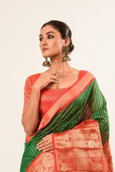 Elevate your ethnic elegance with our exquisite Green Mangalagiri Cotton Silk Zari CheckSaree. This saree featuring a striking red border reflects traditional craftsmanship and modern style. Red Cotton Silk Choli With Traditional Drape, Traditional Red Cotton Silk Choli, Designer Red Cotton Silk Choli, Designer Red Paithani Silk Pre-draped Saree, Red Cotton Silk Lehenga With Pallu, Red Cotton Silk Pre-draped Saree With Dupatta, Red Cotton Silk Pre-draped Saree For Designer Wear, Red Paithani Silk Pre-draped Saree With Unstitched Blouse, Red Pre-draped Saree With Unstitched Blouse In Paithani Silk