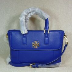 Brand New Never Been Carried. Mercer Mini Satchel By Tory Burch. This Bag Is Made Of Blue Pebbled Genuine Leather. This Bag Is Perfect As A Daily Use Bag. Dimensions: 11" Wide Across Bottom X 7.75" Tall Center X 5.5" Deep. Double Handle 4" Drop. Comes With Long Detachable And Adjustable Strap. Zipper Closure To Single Compartment. Interior: 1 Zipper Pocket And 2 Slip Pockets Exterior: Front Pocket With Flap And Turn Lock Closure. Fabric Lining. Gold Tone Metalware. Tory Burch Outlet Exclusive So Tory Burch Outlet, Tory Burch Bag, Pebbled Leather, Blue Gold, Front Pocket, Zipper Pocket, Tory Burch, Satchel, Adjustable Straps