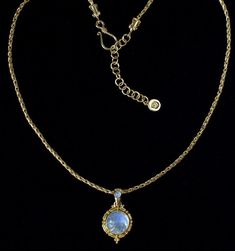 Gold Rainbow Moonstone Necklace This 18K Gold Vermeil Rainbow Moonstone necklace is handcrafted with a detailed Balinese-inspired design, accented by a smaller Rainbow Moonstone on the bail. Comfortable to wear every day, it can be dressed up or dressed down for any occasion. The 18K Gold Vermeil necklace is individually packaged in our black Bluemoonstone Creations gift box with a description card, describing the spiritual and beneficial healing properties of the Rainbow Moonstone gemstones along with a brief bio of the designer. All of our Gold Vermeil Moonstone jewelry is designed in America by Pamela Forman and handcrafted in Bali, where Balinese artisans apply their exquisite skill and traditional background in jewelry-making. Explore our full Tibetan Moon Gold Collection to discover Moonstone Pendant Necklace For Formal Occasions, Gold Moonstone Necklace For Formal Occasions, Elegant Moonstone Necklaces For Formal Occasions, Elegant Moonstone Necklace For Formal Occasions, Formal Gold Moonstone Necklace, Elegant Formal Moonstone Necklaces, Elegant Formal Moonstone Necklace, Balinese Design, Traditional Background