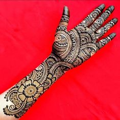 a henna tattoo on someone's hand