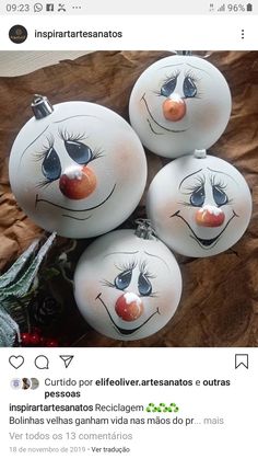 some white balls with faces painted on them