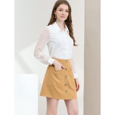 This skirt features buttons front, pockets, and a-line, suitable for spring and summer wear. Suitable for weekend, casual gatherings, shopping, coffee shop, brunch, etc. A comfy triblend skirt is updated with perfectly soft fabric and aline design for understated charm. A comfy spring/summer skirt is updated with perfectly buttons decor, A-line hem, refined silhouette and solid collar for unique feminine and stylish twist. Beige Skort With Pockets For Work, Casual Office Skirt With Relaxed Fit, Casual Business Mini Skirt Lined, Casual Lined Mini Skirt For Business Casual, Solid Color Casual Skirt For Business Casual, Casual Button-up Lined Skirt, Casual Lined Skirt For Business Casual, Casual Mini Skirt For Work, Business Casual Skirt With Pockets