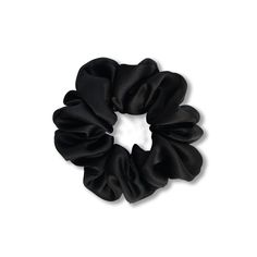 The LBD of hair accessories! A must-have for everyday and special occasions alike. Perfect for walking up Fifth Avenue at 6 with your coffee and a croissant. Buttery one-hundred percent silk charmeuse in black. Wraps around a ponytail 1-2 times depending on hair thickness, typically once for thick-medium hair and twice for fine hair! Constructed with 100% biodegradable 1/2" elastic made from certified organic cotton and natural rubber. Sewn shut by hand.  The Golightly is approximately 4" (10.2 Black Silk Scrunchie, Hair Crunches, Bag Tour, Black Hair Tie, Black Scrunchies, Black Scrunchie, Thick Hair Styles Medium, Black Hair Clips, Hair Thickness