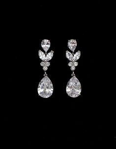 Rhodium silver plated metal setting multi shapes clear white AAA quality teardrop cubic zirconia post earrings with teardrop cz. Total luxury Size: 3.3cm x 1.1cm Earrings Teardrop, Jewelry Bridal, Star Wedding, Clear White, Wedding Earrings, Post Earrings, Bridal Party, Bridal Jewelry, San Jose