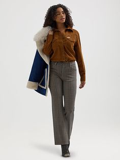 Serving Wild West with a twist, our Women’s Wrancher Plaid Pant can do no wrong. It’s crafted from a comfy cotton blend with just a hint of stretch. This bold take on our iconic bootcut features a mid-rise waist, a fitted silhouette through the seat, a straight leg through the knee, and a leg opening made with boots in mind. You thought the five-pocket styling, “W" stitching, logo patch, and branded hardware were nice, but the fun plaid pattern is the icing on the cake. Mid-rise Bottoms For Fall Rodeo, Cotton Bottoms With Pockets For Rodeo, Fitted Bottoms For Rodeo In Fall, Mid-rise Cotton Bottoms For Rodeo, Western Style Brown Bottoms For Fall, Western Style Fitted Pants For Fall, Western-style Fitted Pants For Fall, Fitted Western Pants For Fall, Western Style Mid-rise Cotton Bottoms