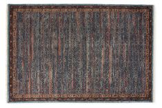 an antique rug with multicolored stripes and fringes on the bottom, in blue tones