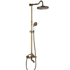 an old fashioned shower head with thermostaer and hand held shower faucet