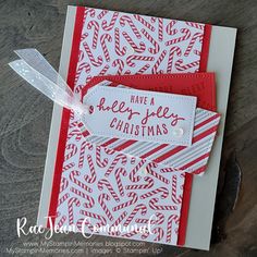 a close up of a christmas card with candy canes on the front and bottom