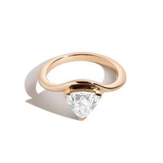 Base price reflects a cultivated/1 carat/I-J color diamond. We uphold our brand promise of honoring personal journeys by inviting our customers to celebrate one of life’s biggest milestones with the 2018 Diamond Foundry Deco Capsule. The bridal collection draws inspiration from the decadence of the roaring 20’s, made anew by fashioning the deco silhouettes into minimal designs better fit for 2020. A designer favorite. A brilliant trillion diamond becomes the eye of this curved band, designed as Shahla Karimi, Huge Diamond Rings, Triangle Eye, Trillion Diamonds, Ring Stacks, Roaring 20, Diamond Eternity Wedding Band, Triangle Ring, Gorgeous Engagement Ring