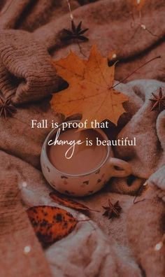 fall is proof that change is beautiful with leaves and a tea cup on the bed