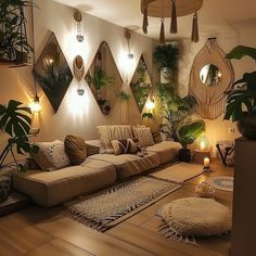 a living room filled with lots of furniture and plants on top of wooden flooring