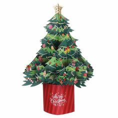 an origami christmas tree sitting on top of a red potted planter