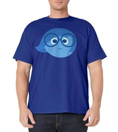 a man wearing a blue t - shirt with an image of a bird on it