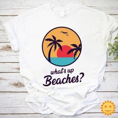 Product details: ✔️ NAME: What's Up Beaches Vintage T-Shirt, Summer Vacation Shirt, Holiday Shirt, Vacation Shirt, Brooklyn Nine Nine Shirt, Captain Holt Shirt ✔️ IMPORTANT NOTE: Both Men and Women can we our shirts because this is unisex style t-shirts;  Wash item inside out in cold water, do not bleach, do not dry clean, do not iron directly on the design. ✔️ MATERIAL: 5.3-ounce, 100% cotton (99/1 cotton/poly (Ash) & 90/10 cotton/poly (Sport Grey); Heavyweight classic unisex tee; Taped neck and shoulders; Tearaway label; Decoration type: Digital Print ✔️ OUR DESIGN PRODUCTS: Each One are designed and sold in limited quantities. The designs are created by our incredibly talented in house graphic art team who often hand draw and illustrate each Tee shirt design. ✔️ SIZE CHART: Please refer Summer White Camp Shirt With Letter Print, White Summer Camp Shirt With Letter Print, White Letter Print Camp Shirt For Summer, White Slogan Top For Beach Season, Vacation Graphic Tee Shirt With Graphic Print, Vacation Graphic Tee With Letter Print, Vacation Tops With Funny White Print, Vacation Graphic Tee With Graphic Print, White T-shirt With Funny Print For Vacation