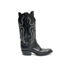 Vintage 1970s mens black leather embossed western stitched mid calf cowboy boots by Tony Lama. Features black leather uppers, embossed foot box, rounded toe, western stitched shaft, rounded tops, pull on loops, mid calf rise, and thick block heel. Excellent vintage condition.   Heel to toe (inside shoe): 10.75 inches  Ball of foot (bottom of sole): 3.5 inches  Heel height: 1.625 inches  Shaft height: 12.5 inches  Circumference: 13.5 inches  Size 8.5 D Cowboy Boots Black, Inside Shoes, Mens Cowboy, Tony Lama, Mens Cowboy Boots, Mens Black Leather, Cowboy Western, Mens Shoes Boots, Western Cowboy Boots