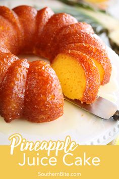 a pineapple juice cake on a plate with a knife