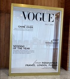 the front cover of a magazine in a glass case