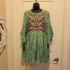 Nwt, Umgee, Size Large, Not Stretchy, Shorter Dress, Lined, Shorter Sleeves With Large Belles, Keyhole In Back With Single Button. 70% Rayon 30% Polyester Pit To Pit 20" Length 33" Price Is Listed As Firm. Thanks For Understanding. Casual Green Tunic Dress, Spring Casual Mini Tunic, Spring Festival Boho Rayon Dress, Casual Green Tunic Mini Dress, Green Rayon Knee-length Dress, Green Knee-length Rayon Dress, Embroidered Tunic Mini Dress For Summer, Summer Embroidered Tunic Mini Dress, Green Boho Tunic Dress