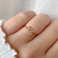 The Elna Ring is a whimsical leaf design, embellished with a sparkly pink crystal. Main material: Rose Gold, Rhodium, 16k Gold Plated on Brass, Cubic Zirconia Need some jewelry inspiration? Follow us on Instagram  @statementGrey Cute Promise Rings, Hand Jewelry Rings, Pretty Jewelry Necklaces, Gold Rings Fashion, Gold Ring Designs, Classy Jewelry, Fancy Jewellery, Fancy Jewelry, Cute Rings