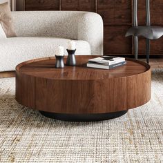 a living room with a couch, chair and coffee table