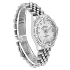 Rolex Datejust Midsize Steel White Gold Diamond Ladies Watch 178384. Officially certified chronometer automatic self-winding movement. Stainless steel oyster case 31.0 mm in diameter. Rolex logo on the crown. 18K white gold bezel set with original Rolex factory diamonds. Scratch resistant sapphire crystal with cyclops magnifier. Silver dial with original Rolex factory diamond hour markers. Date calendar at 3 o'clock aperture. Stainless steel jubilee bracelet with hidden clasp. Fits 6.5" wrist. Timeless Diamond Chronograph Watch, Classic White Gold Diamond Chronograph Watch, Classic White Gold Diamond Watch With Chronograph, Timeless Round Diamond Watch With Chronograph, Classic White Diamond Watch With Date Display, Timeless Round Chronograph Watch With Date Indicator, Classic Round Chronograph Watch With Date Indicator, Elegant Silver Chronograph Watch With Date Indicator, Formal Diamond Watch With Round Dial And Date Display