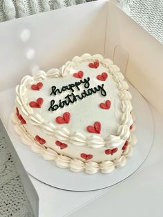 a heart shaped birthday cake in a box