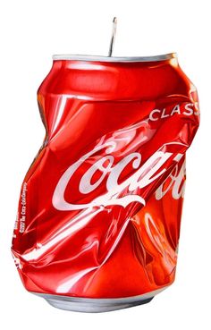 a close up of a can of coca - cola on a white background with clippings