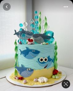 there is a cake decorated with sea animals on it