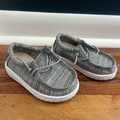 Brand New, Never Worn. No Tags. Baby Hey Dudes Shoes, Gray Casual Sneakers With Soft Sole, Casual Gray Sneakers With Soft Sole, Casual Canvas Shoes With Round Toe For Playtime, Casual Slip-on Canvas Shoes With Soft Sole, Hey Dude Shoes, Hey Dudes, Hey Dude, Baby Size