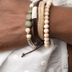 Mismatched Strands Of White Wooden Beads, Green Stones, And Silver Beads Join A Brown Leather Band And Braided Strand Of Twine Around The Wrist, Resulting In Earthy Layers. Features An Adjustable Sliding Knot Closure. Sold As One Individual Bracelet. Casual White Jewelry With Wooden Beads, White Wooden Beads Bracelet, Adjustable Silver Jewelry With Wooden Beads, Casual Cream Beaded Jewelry, Adjustable Cream Jewelry With Wooden Beads, Wooden Beaded Bracelets, Adjustable Sliding Knot, Curated Closet, Green Bracelet