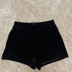 Black High-Waisted Velvet Shorts From Express. Never Worn High Waist Bottoms With Built-in Shorts For Date Night, Stretch Short Length Bottoms For Date Night, High Rise Stretch Shorts For Night Out, Fitted High Rise Shorts For Party, High-waist Bottoms With Built-in Shorts For Date Night, Stretch High Rise Shorts For Night Out, Chic Bottoms With Short Inseam For Date Night, Chic Bottoms For Date Night With Short Inseam, Fitted Shorts With Elastic Waistband For Night Out