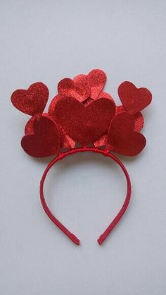 a red headband with hearts on it