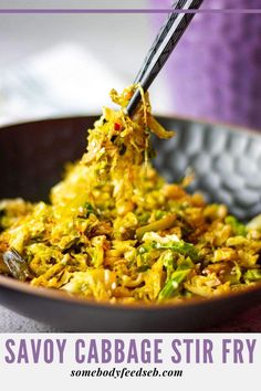 savoy cabbage stir fry in a black bowl with text overlay that reads savoy cabbage stir fry