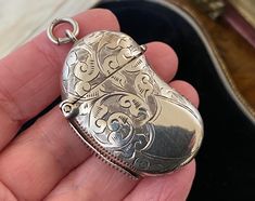 This item measures approximately 4.3cms in height by 2.7cms in length. it weighs approximately - 12.77gms. A fabulous unusual Antique Victorian lucky bean engraved sterling silver vesta /fob /pendant  A fully English hallmarked for Sterling Silver date letter for 1900. Box in photographs not included in the sale. Please see photographs for more accurate description. Wear and tear to be expected on a vintage item. Kidney Bean, English Antiques, Locket Necklace, Antique Victorian, Necklace Pendant, Sterling Silber, Locket, Vintage Items, Jewelry Necklaces