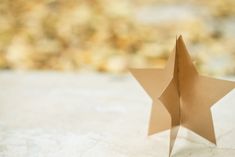 an origami star sitting on top of a table