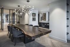 a large wooden table sitting in the middle of a room