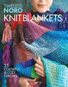 a woman wearing a knitted shawl on the cover of knitting magazine