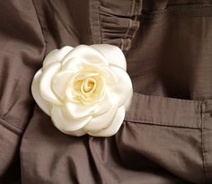 "Beautiful, delicate satin camellia flower with burgundy red /or other colour/ silk /satin/, perfect for wedding and parties. This flower brooch is the perfect addition to your outfit. It looks stunning on hats, jackets, dresses, scarfs, purses and clutches alike. Size: approx. /shown in picture/ 3\" (~8.5 cm) in diameter. If you need a flower of a different colour, or more than one flower, let me know! To see more flower brooches and hair accessories, just click the link: https://www.etsy.com/s Elegant Rosette Brooches As A Gift, Elegant Rosette Wedding Brooches, Elegant Rose Brooch With Handmade Flowers, Elegant Rose Brooches With Handmade Flowers, Elegant Rose Brooches For Wedding, Elegant Rose Wedding Brooches, White Corsage, White Camellia, Dance Accessories