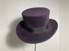 "Top Hat / Purple Fur Felt Hand-blocked and hand stitched by me Welted brim edge with invisible stitching to hold it in place  Size: L (58cm) 23 3/4\" circumference Height: 11.5 cm / 4.5\" tall* Brim (flared, lower part of the hat): 4.5cm wide Top of the crown: 62cm circumference Materials: fur felt, grosgrain ribbon *Up to 6\" for custom order @ extra charge Custom orders turnaround from 1 to 3 weeks depending on material availability. Please feel free to contact me." Fitted High Crown Felt Hat For Fall, High Crown Fur Felt Fedora For Winter, Winter High Crown Fur Felt Fedora, High Crown Fur Felt Hat For Winter, Winter High Crown Fur Felt Hat, Fitted Fur Felt Fedora With High Crown, High Crown Fur Felt Fedora, Fitted High Crown Fur Felt Fedora, Winter Fur Felt Fitted Hats