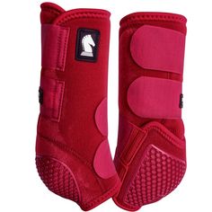 a pair of red boots that are on top of each other