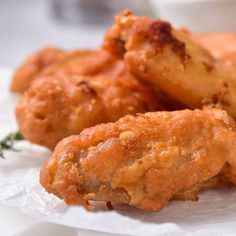 some fried food sitting on top of a piece of paper