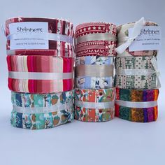 several different types of ribbons are stacked on top of each other