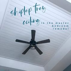 a ceiling fan with the words shiplap tray ceiling written in blue on it